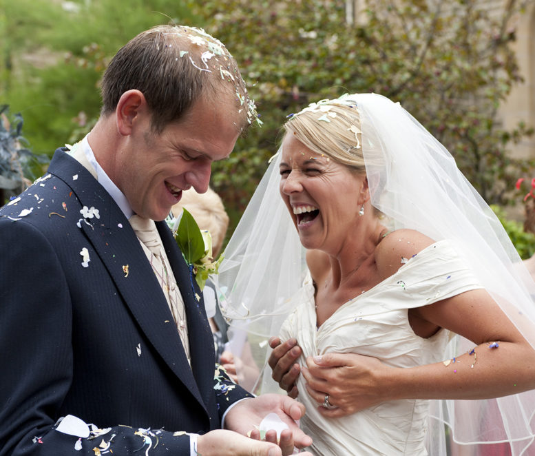 Why do we throw confetti at a wedding?